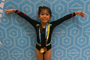 Student Earns Gold in Gymnastics